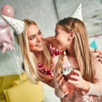 Happy,Birthday!,Girl,Blowing,Out,Candles,On,Birthday,Cake,,Pretty